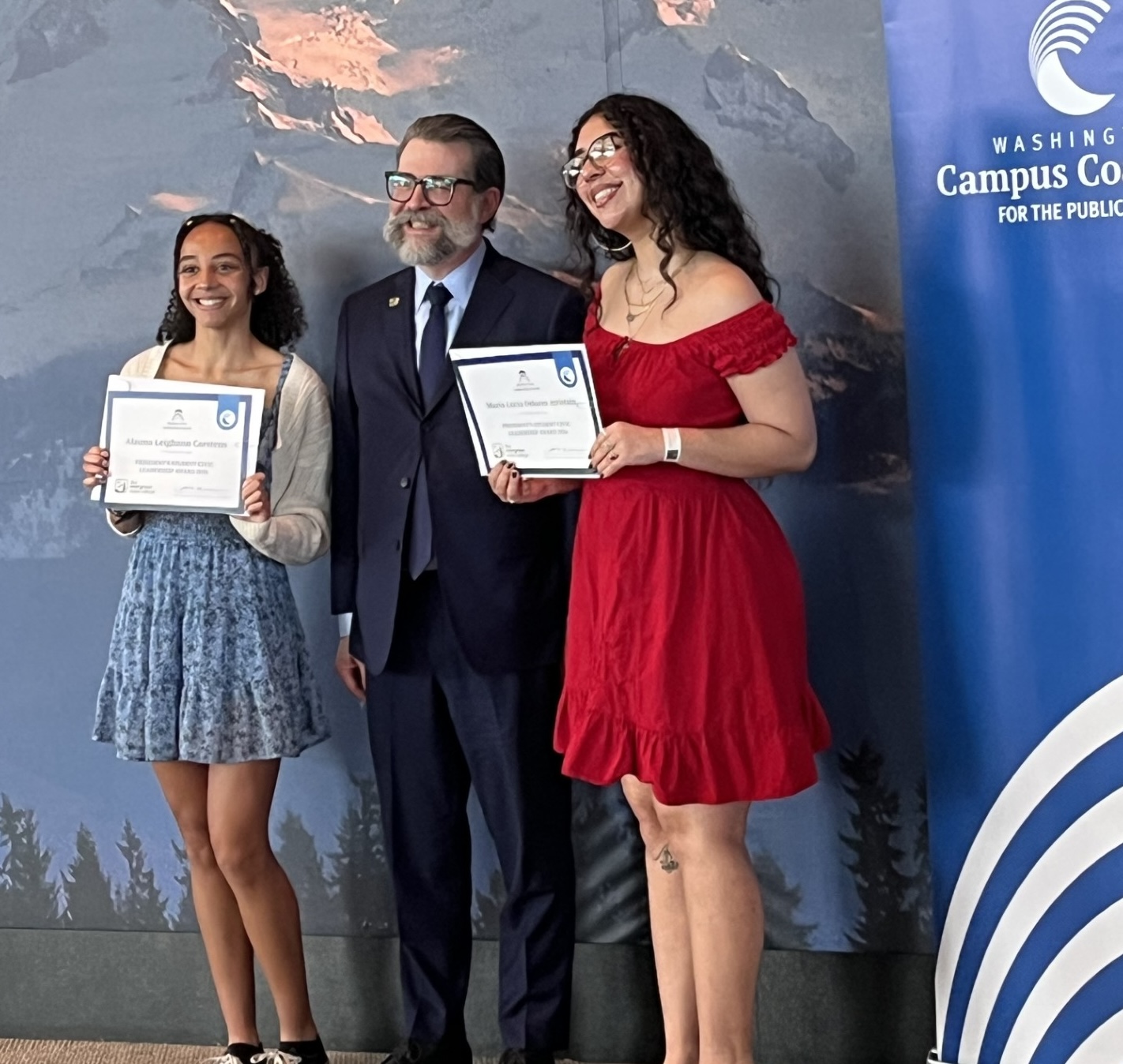 Maria and Alauna receiving awards at the Governor's Ball