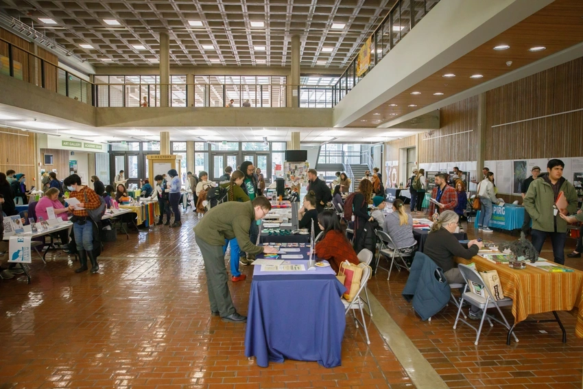 Community Internship Fair with people interacting 